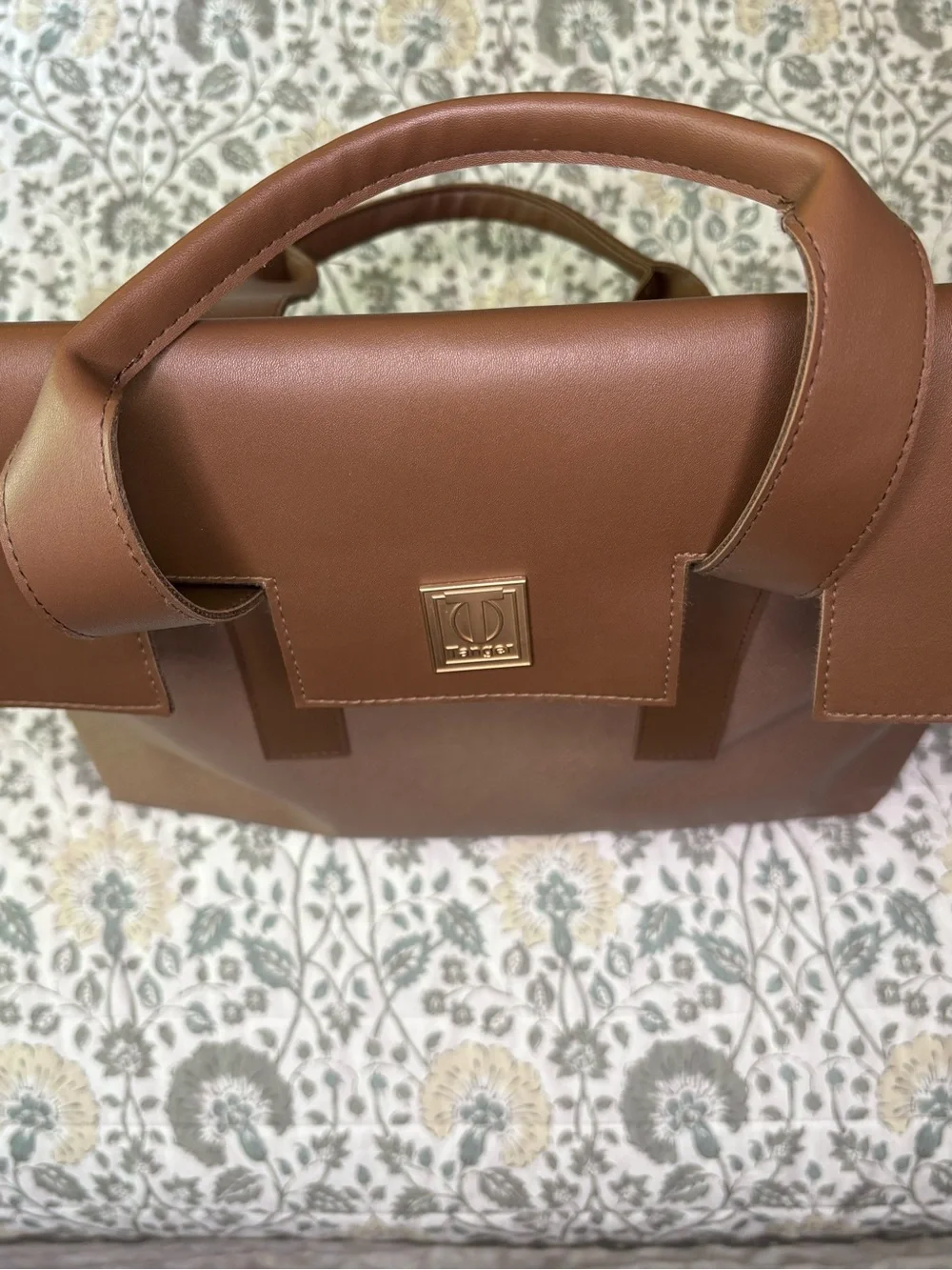 Textured Brown Tote with Top Handles and Gold Plaque